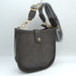 Minimalist Curved Crossbody Bag with Patterned Guitar Strap