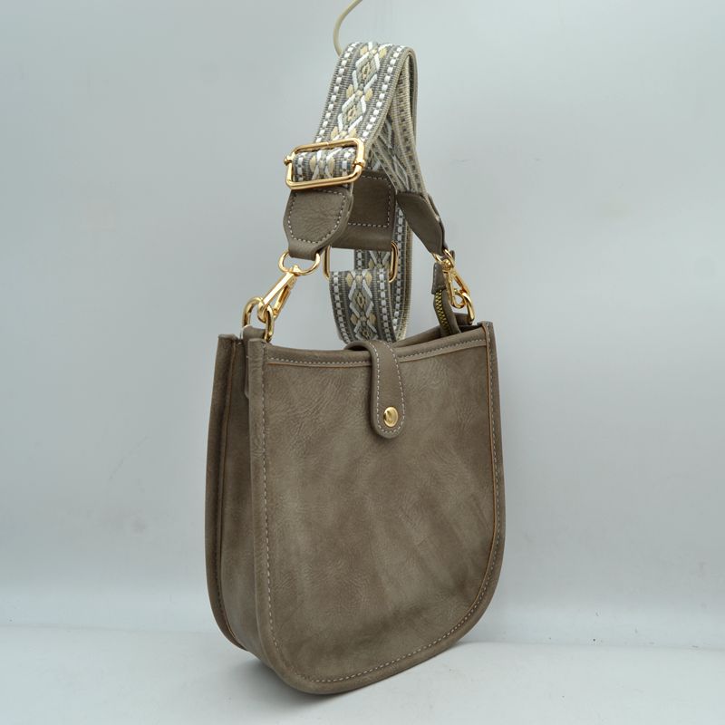Minimalist Curved Crossbody Bag with Patterned Guitar Strap