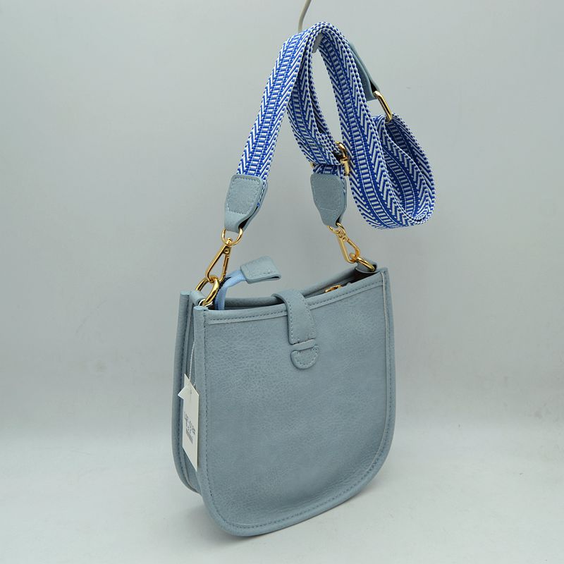 Minimalist Curved Crossbody Bag with Patterned Guitar Strap