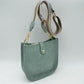 Minimalist Curved Crossbody Bag with Patterned Guitar Strap