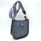 Minimalist Curved Crossbody Bag with Patterned Guitar Strap