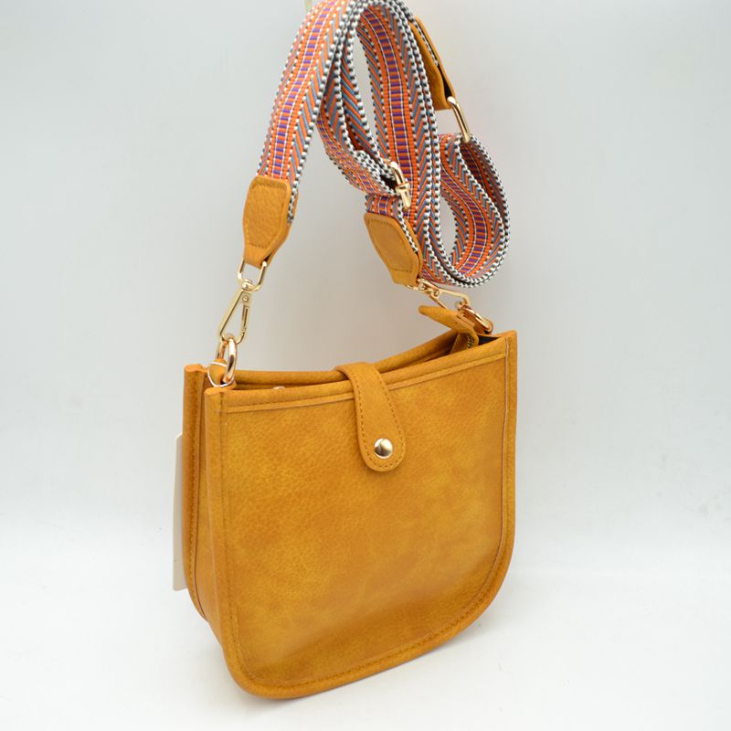 Minimalist Curved Crossbody Bag with Patterned Guitar Strap
