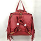 Faux Leather Moto Jacket Backpack with Side Fringe Accents