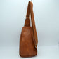 Grained Sling Bag with Perforated Accent and Gold Zippers