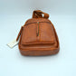 Grained Sling Bag with Perforated Accent and Gold Zippers
