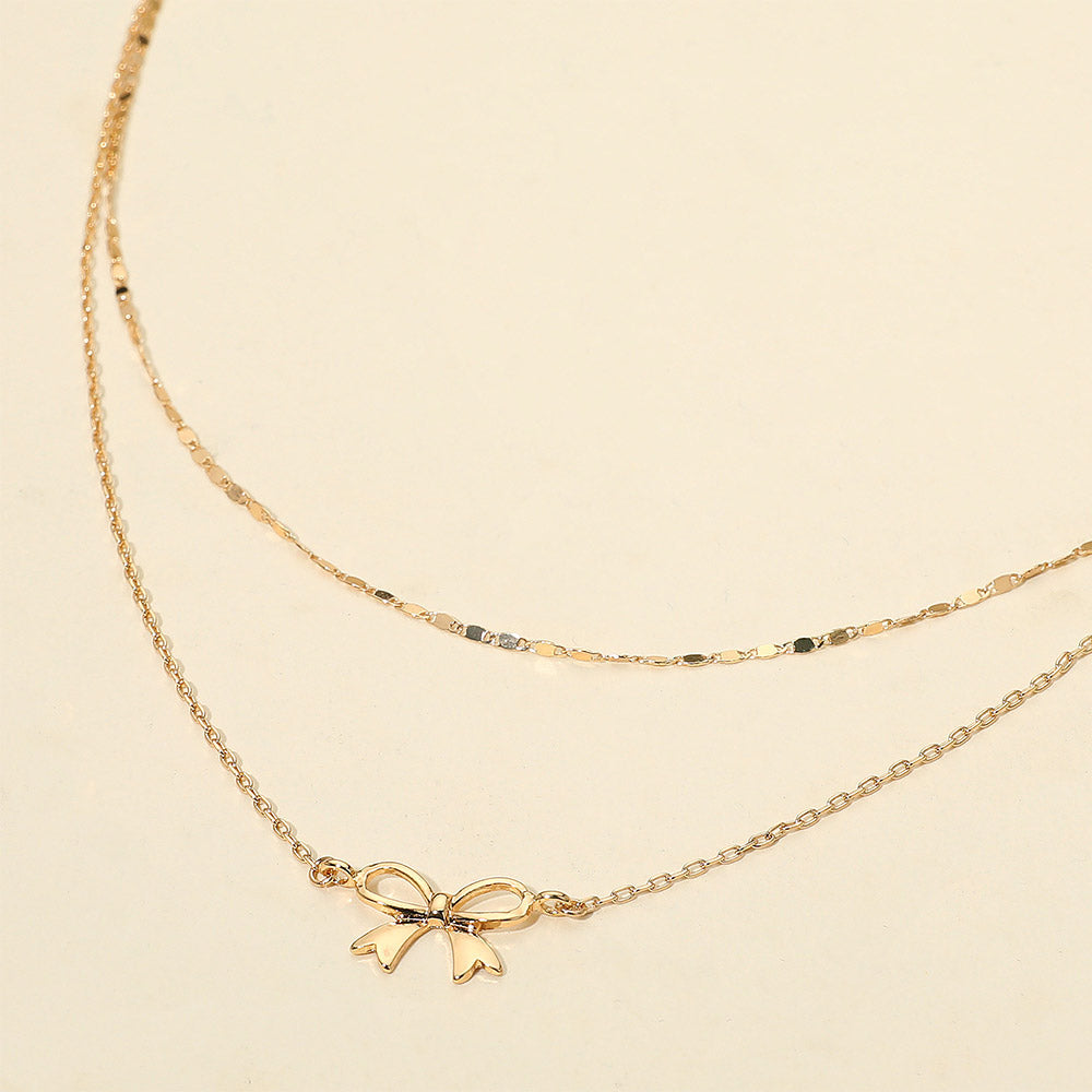 Metal Bow Pendant Accent Layered Chain Necklace