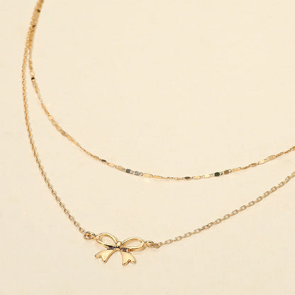 Metal Bow Pendant Accent Layered Chain Necklace