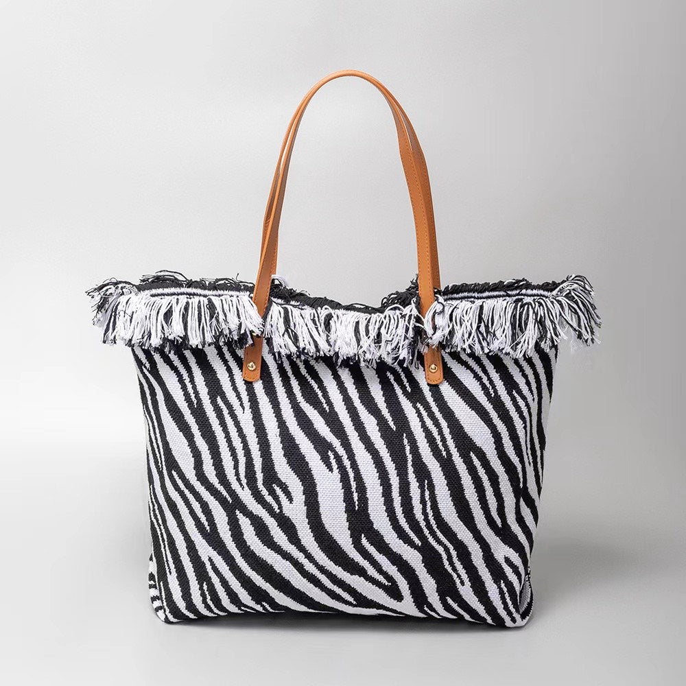 Classic Trapeze Tote Bag with Dual Handles and Ring Detail