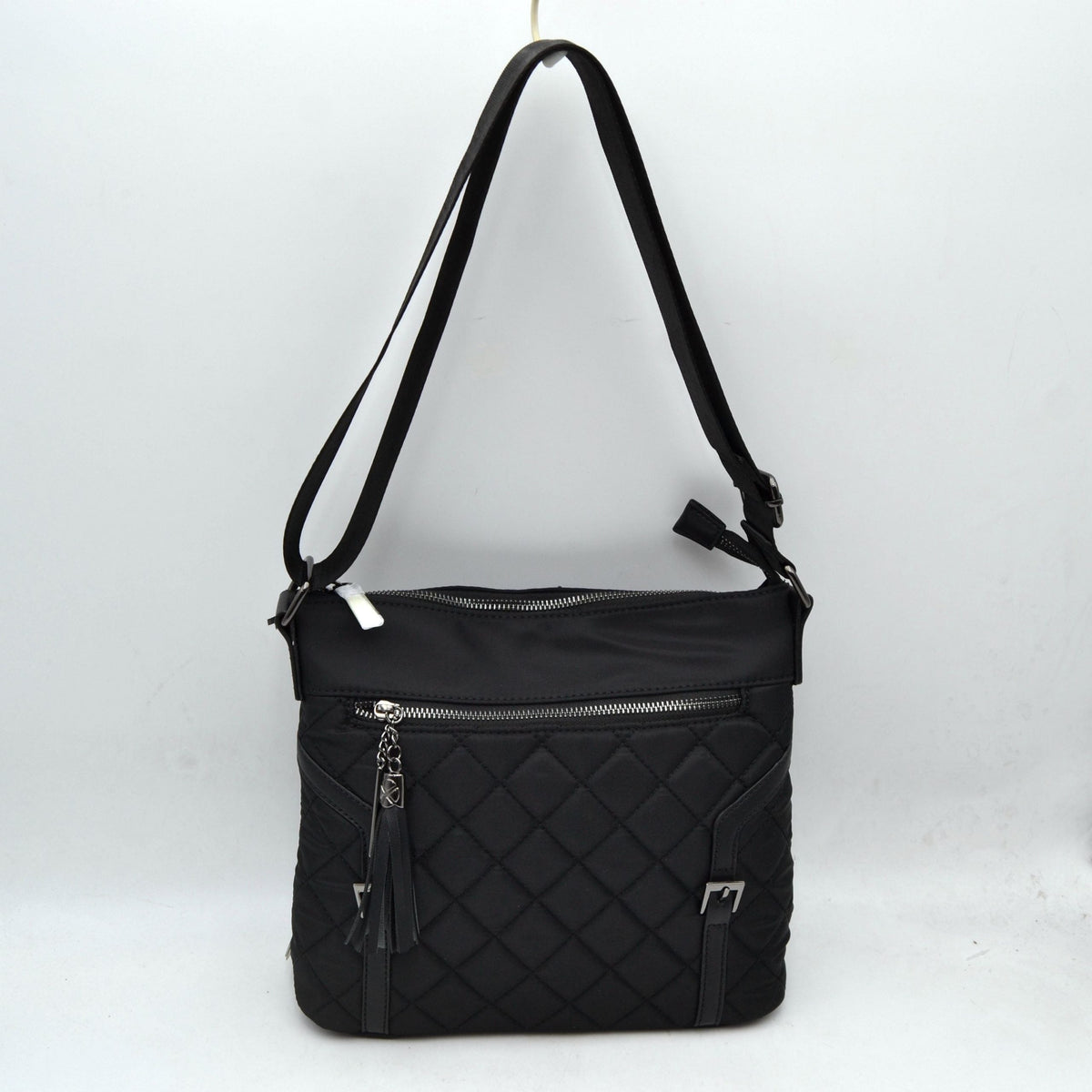 Quilted Nylon Crossbody Bag with Buckle Accents and Tassel Charm