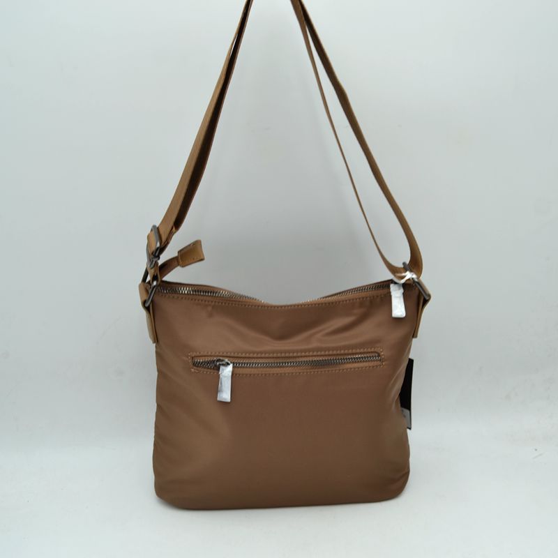 Quilted Nylon Crossbody Bag with Buckle Accents and Tassel Charm