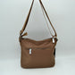 Quilted Nylon Crossbody Bag with Buckle Accents and Tassel Charm