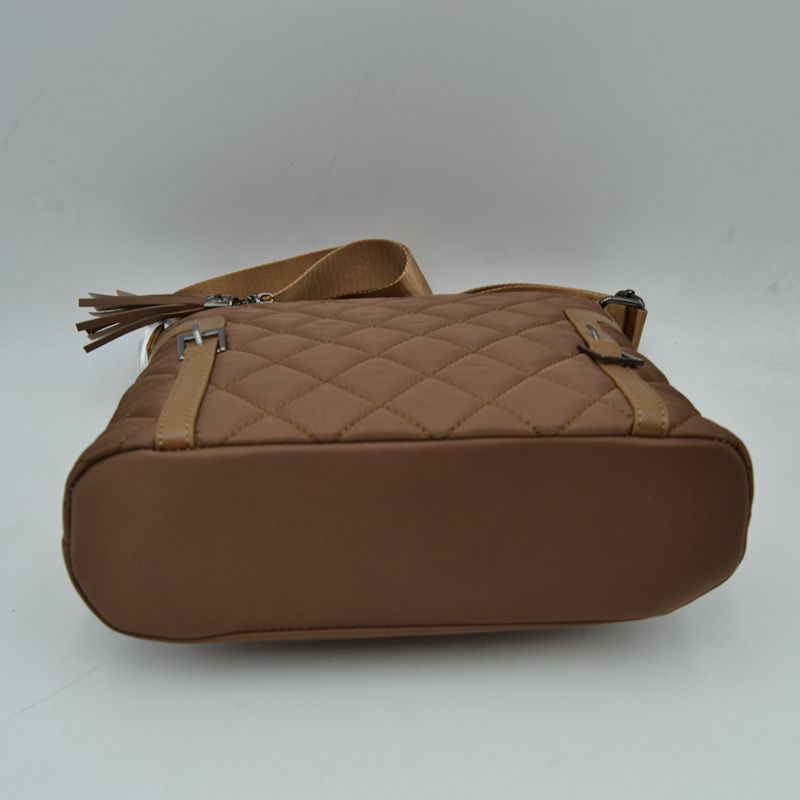 Quilted Nylon Crossbody Bag with Buckle Accents and Tassel Charm