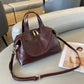 Women's Large Capacity Genuine Leather Dumpling Texture Vegetable Tanned Oil Handbags