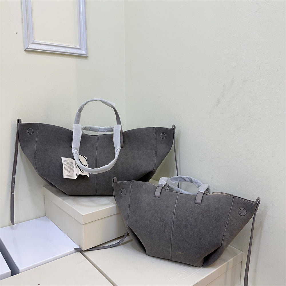 Pauline Matte Leather Wings Style Barrel Bags