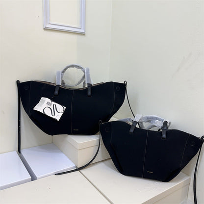 Pauline Matte Leather Wings Style Barrel Bags