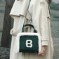 Women's Live Lamb Real Wool Down Portable Handbags