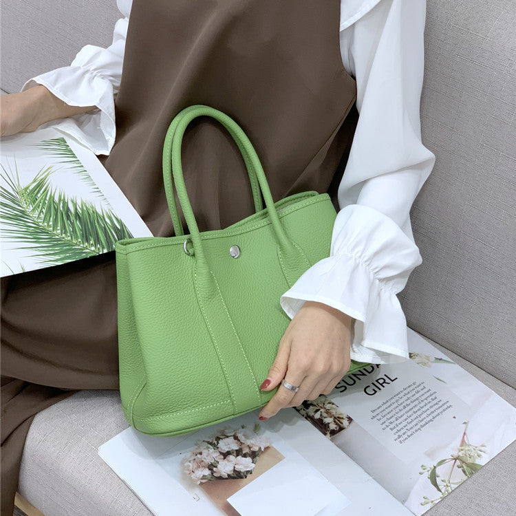Women's Garden Layer Cowhide Lychee Pattern Wide Handbags