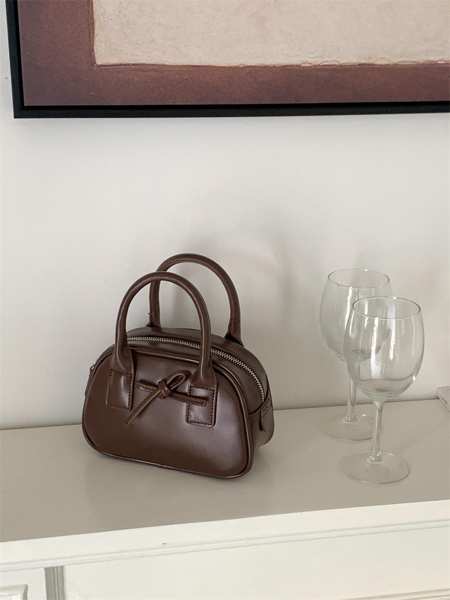 Women's Bow Shaping Fashion Hand Carrying Saddle Handbags