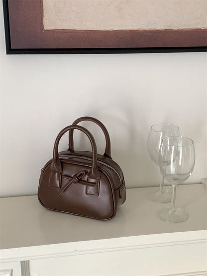 Women's Bow Shaping Fashion Hand Carrying Saddle Handbags