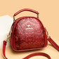 Women's Niche High Sense Round Embossed Mom Handbags
