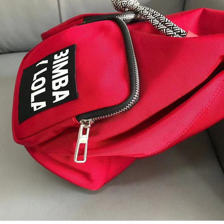 Spanish Lola Spring Diagonal Versatile Letter Backpacks