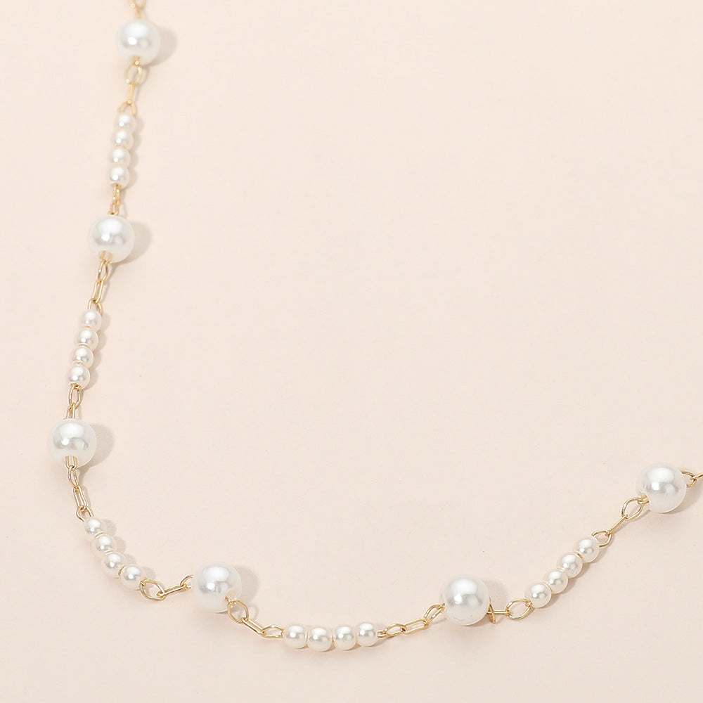 Elegant Graduated Pearl Station Necklace