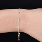 Pulsera de siete peridotos engastados en bisel