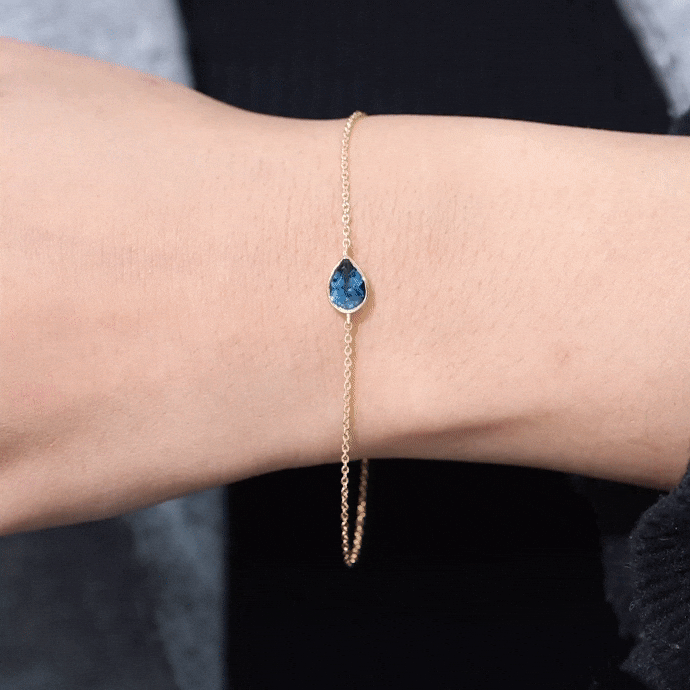 Pulsera de cadena solitaria de topacio azul de Londres talla pera de 0,7 quilates