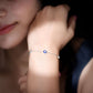 Bezel Set Fire Opal Evil Eye Station Bracelet for Women