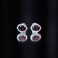 3 Carat Garnet Oval Stud Earrings with Moissanite Halo