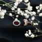 3 Carat Garnet Oval Stud Earrings with Moissanite Halo