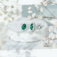 Lab Created Emerald Oval Stud Earrings with Moissanite Halo