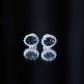 2.2 Carat Oval London Blue Topaz Stud Earrings with Moissanite Halo