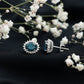 2.2 Carat Oval London Blue Topaz Stud Earrings with Moissanite Halo