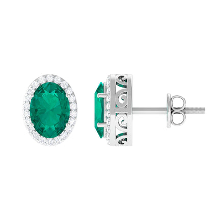 Pendientes de botón clásicos con halo de esmeralda y diamante de 1,4 quilates
