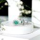 Natural 0.8 Carat Oval Cut Emerald and Diamond Earrings