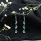 Pear Cut Emerald Dangle Earrings with Diamond