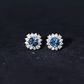 Real London Blue Topaz and Diamond Halo Stud Earrings