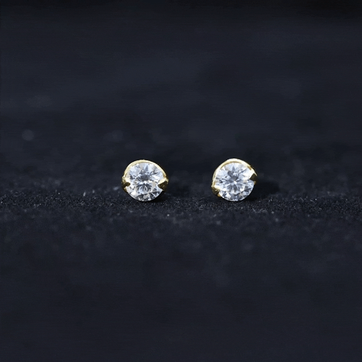 Pendientes de solitario minimalistas de moissanita redonda de 0.63 quilates
