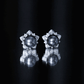 Aretes de botón de flor con perlas negras de Tahití y diamantes auténticos