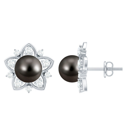 Aretes de botón de flor con perlas negras de Tahití y diamantes auténticos