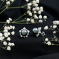 Aretes de botón de flor con perlas negras de Tahití y diamantes auténticos