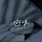 Aretes de botón de flor con perlas negras de Tahití y diamantes auténticos