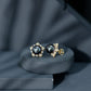 Aretes de botón de flor con perlas negras de Tahití y diamantes auténticos