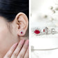 Genuine Oval Cut Ruby and Diamond Halo Stud Earrings