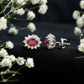Genuine Oval Cut Ruby and Diamond Halo Stud Earrings