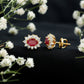Genuine Oval Cut Ruby and Diamond Halo Stud Earrings