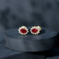 Genuine Oval Cut Ruby and Diamond Halo Stud Earrings
