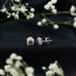 0.6 Carat Garnet Classic Stud Earrings with Diamond Halo