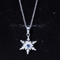 Collar con colgante de copo de nieve contemporáneo de zafiro azul y diamantes